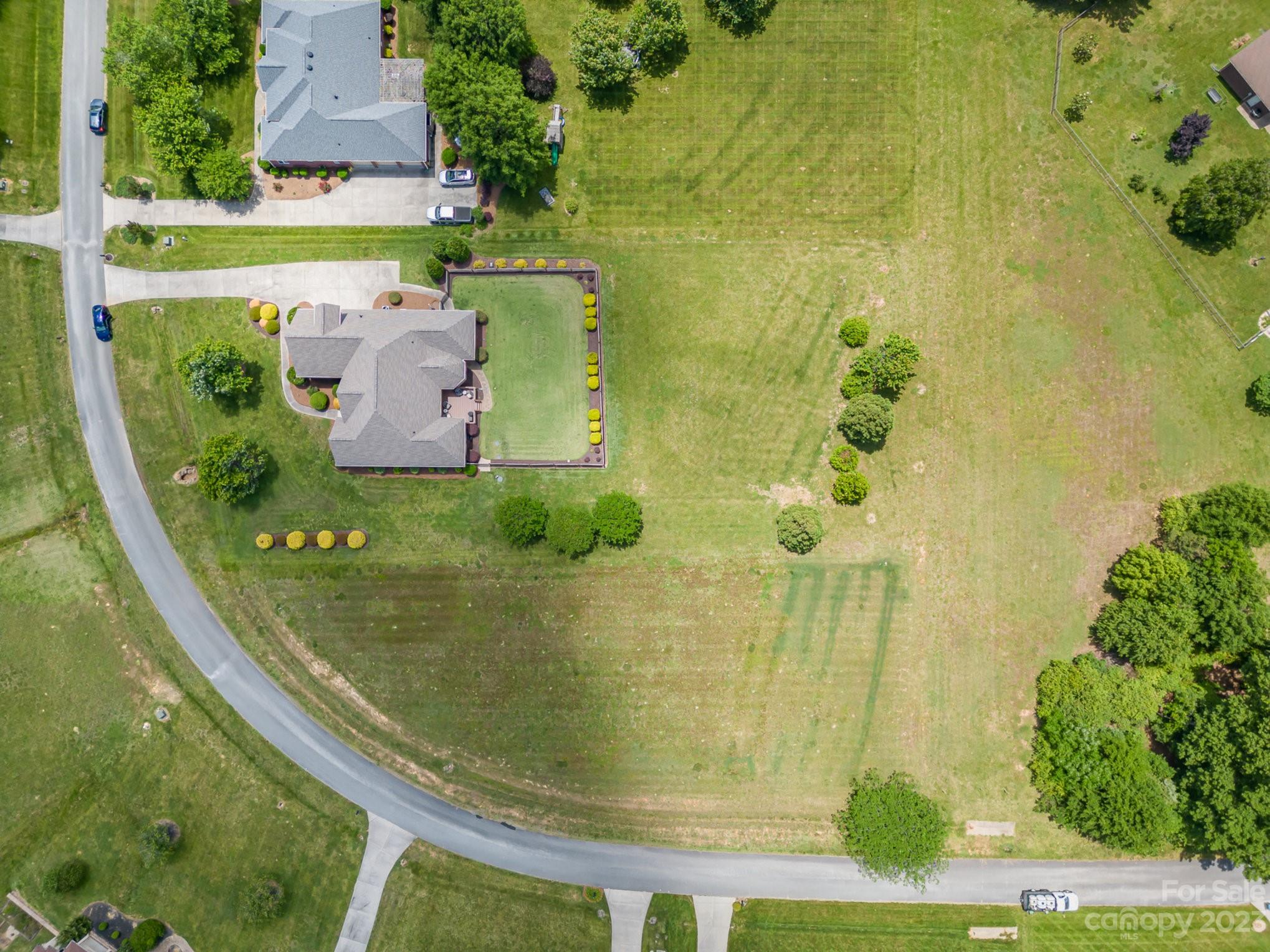 4733 Campobello Drive Monroe, NC 28110 - Photo 41 of 43 a view of a swimming pool with a yard