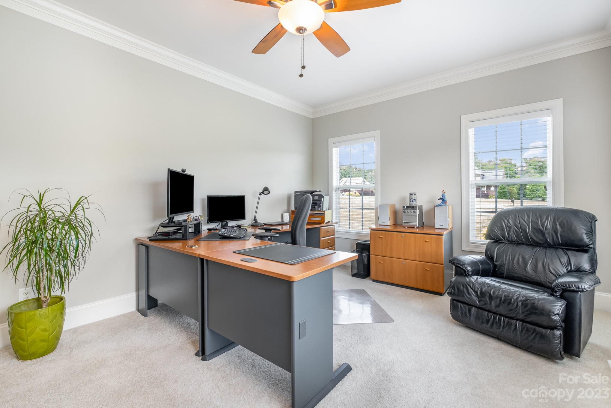 4733 Campobello Drive Monroe, NC 28110 - Photo 8 of 43 a view of a livingroom with furniture and a flat screen tv