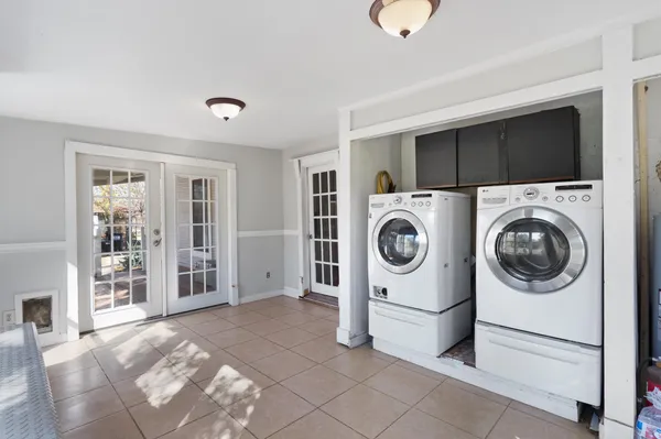a view of a storage & utility room with washer and dryer