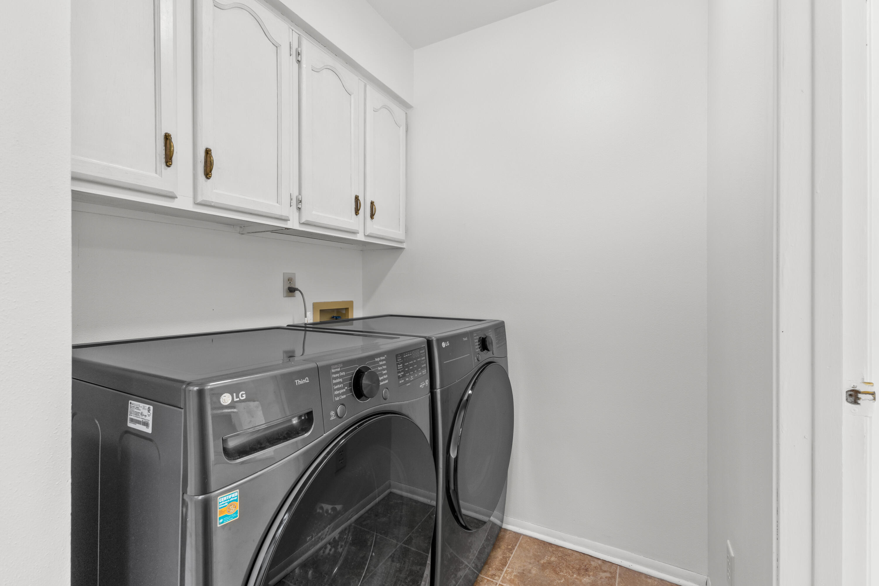 6609 Radburn Lane Greendale, WI 53129 - Photo 16 of 35 Main level laundry off kitchen.