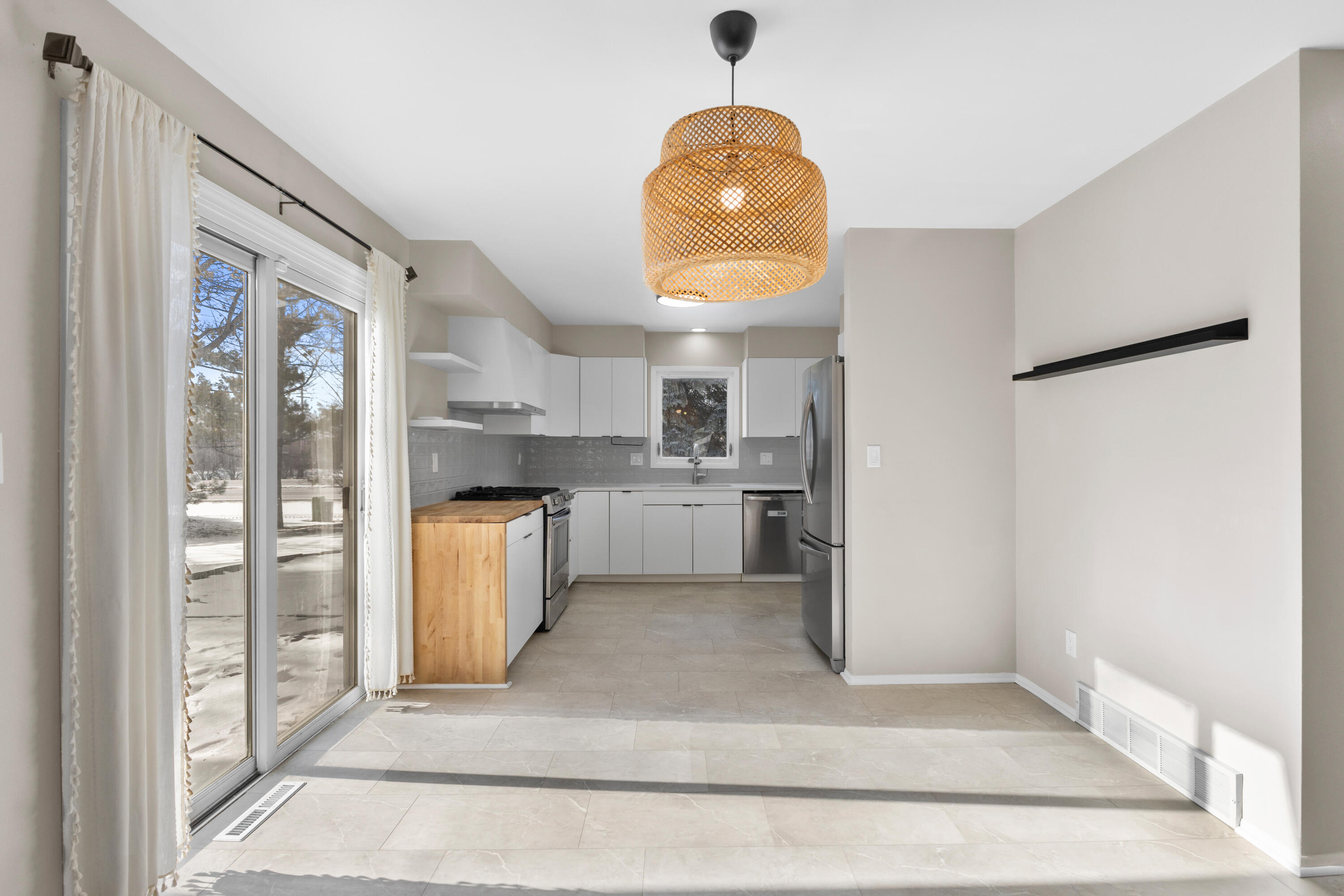 6609 Radburn Lane Greendale, WI 53129 - Photo 7 of 35 Sliding doors to private patio.