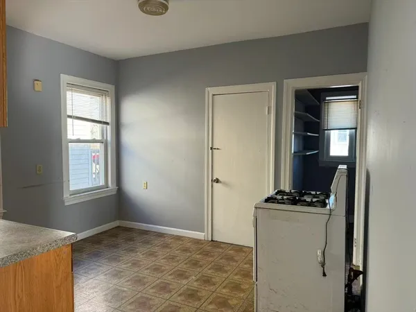 a view of kitchen and utility room
