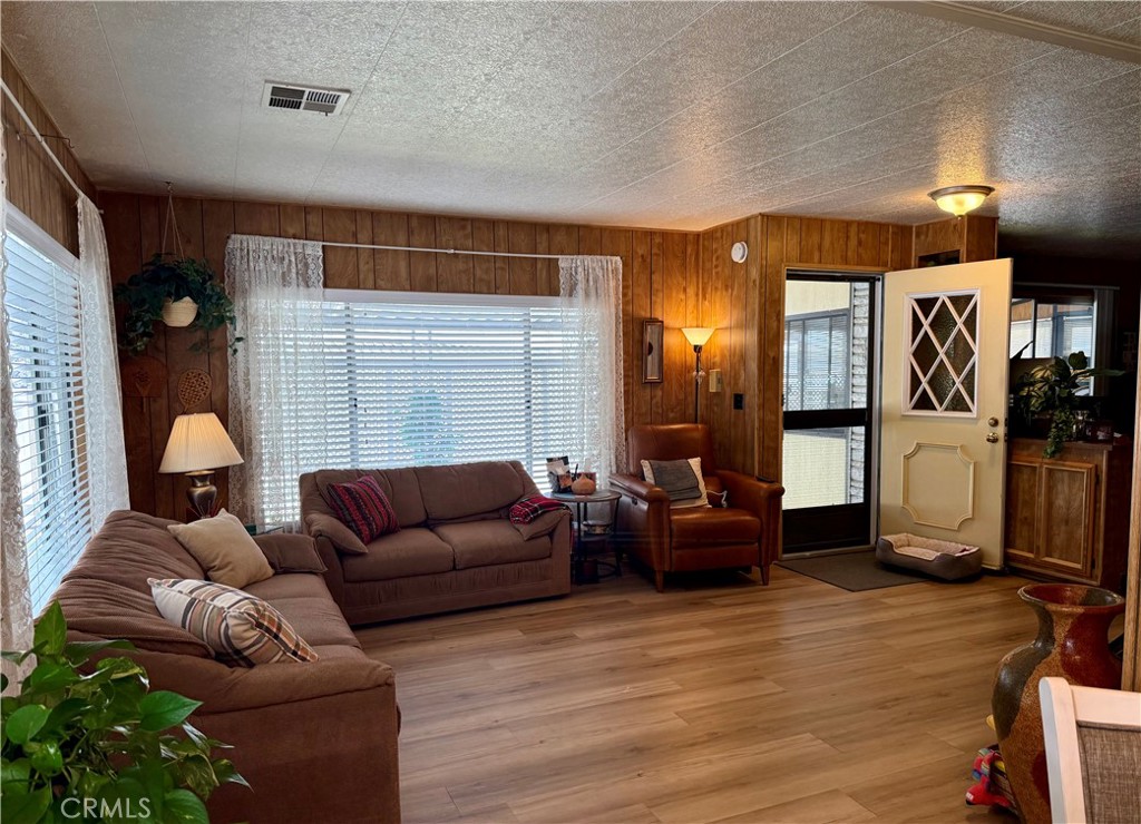 71 Van Buren Riverside, CA 92504 - Photo 5 of 30 a living room with furniture and a flat screen tv