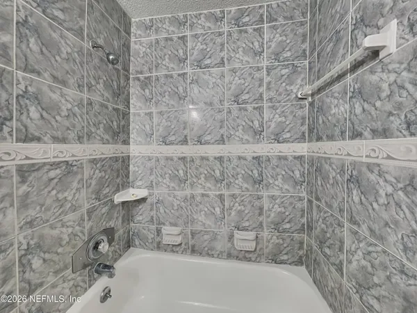 a bathroom with a bathtub