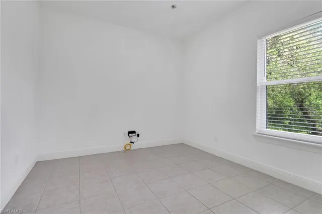 a view of a window in an empty room