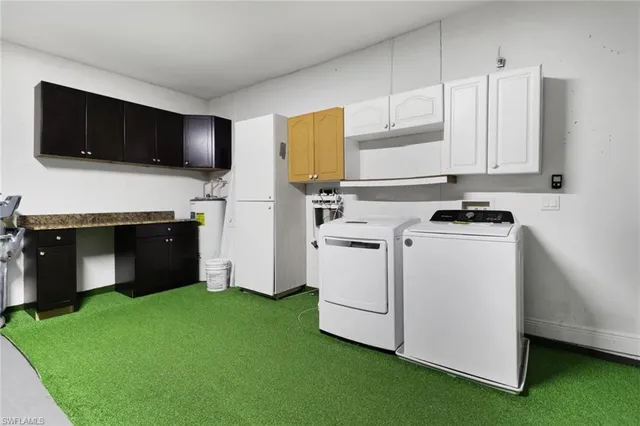 a kitchen with a stove and a microwave