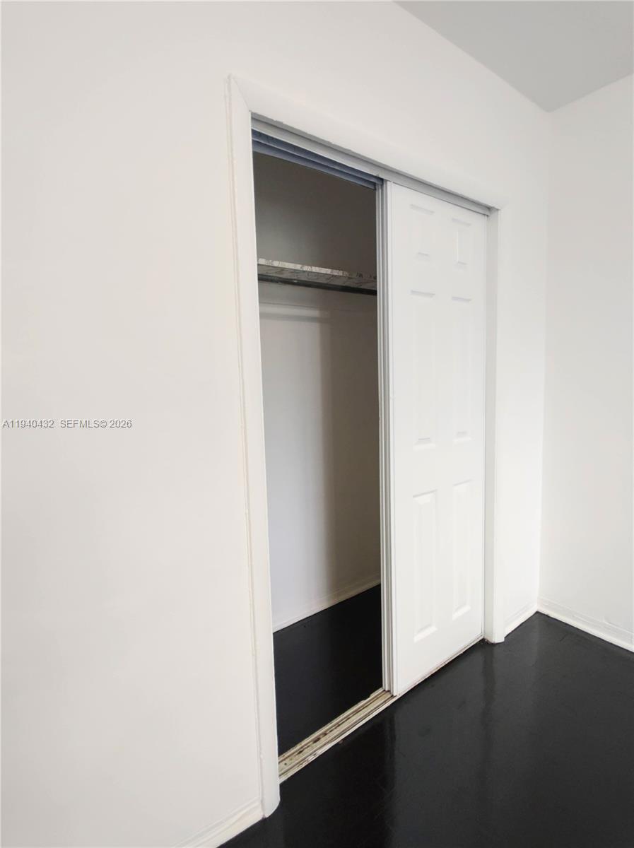 1565 Southwest 6th Street, Unit 1 Miami, FL 33135 - Photo 10 of 17 a view of an empty walk in closet
