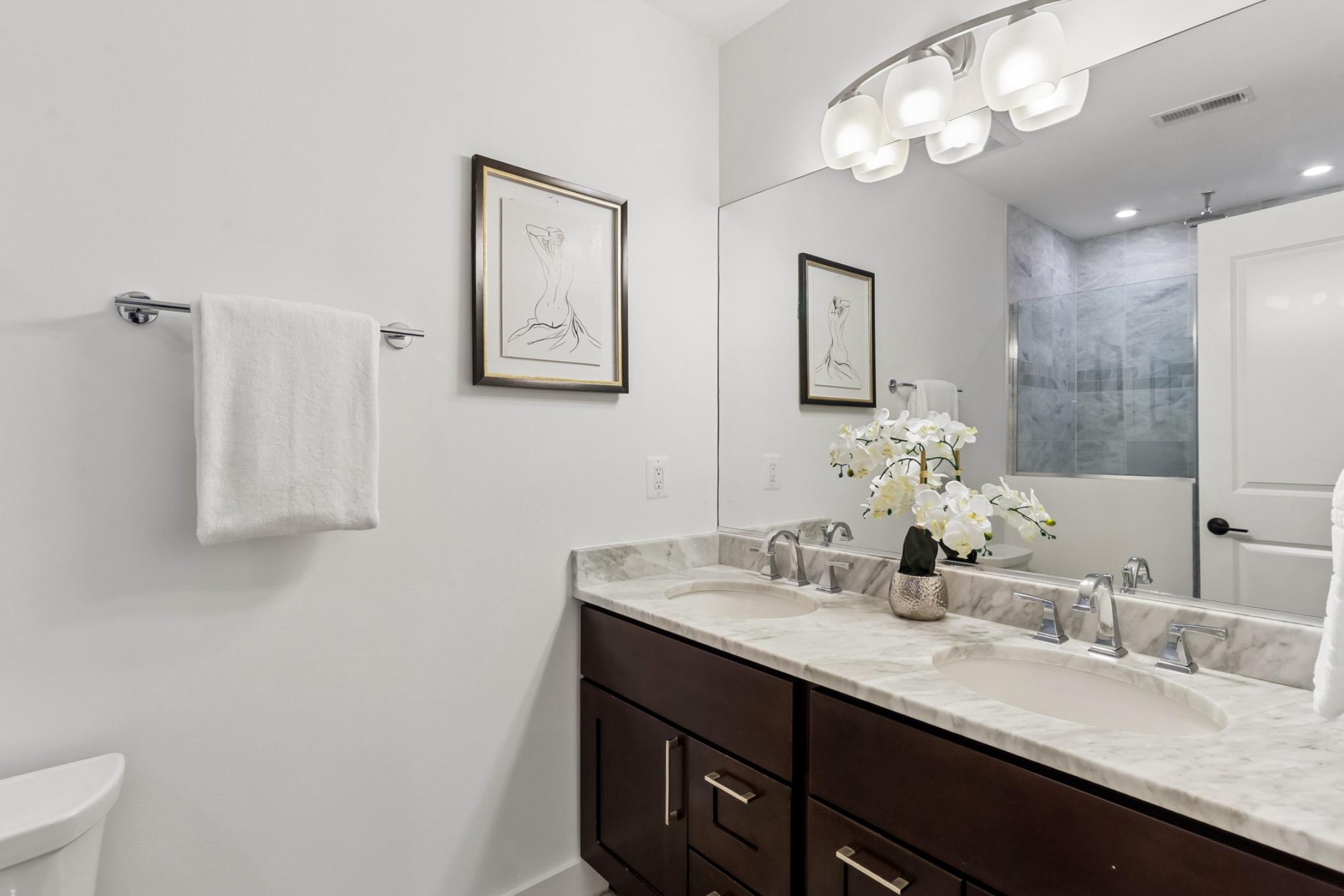 1311 K Street Southeast, Unit 1 Washington, DC 20003 - Photo 17 of 33 Double vanity in primary bath.