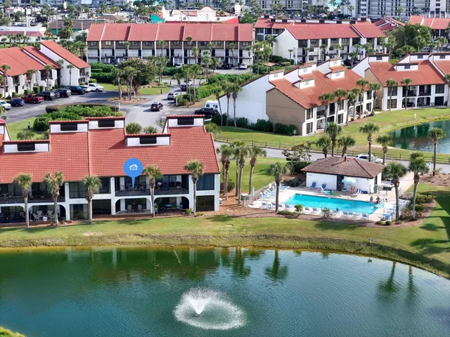 a view of a swimming pool with a lake view