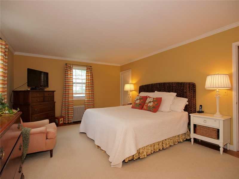 6 By Road Darien, CT 06820 - Photo 12 of 19 a bedroom with a bed and a tv
