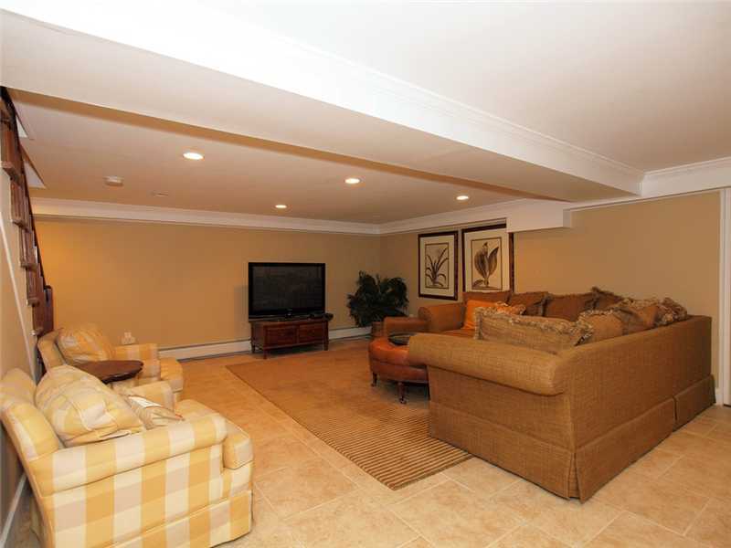 6 By Road Darien, CT 06820 - Photo 17 of 19 a living room with furniture and a flat screen tv