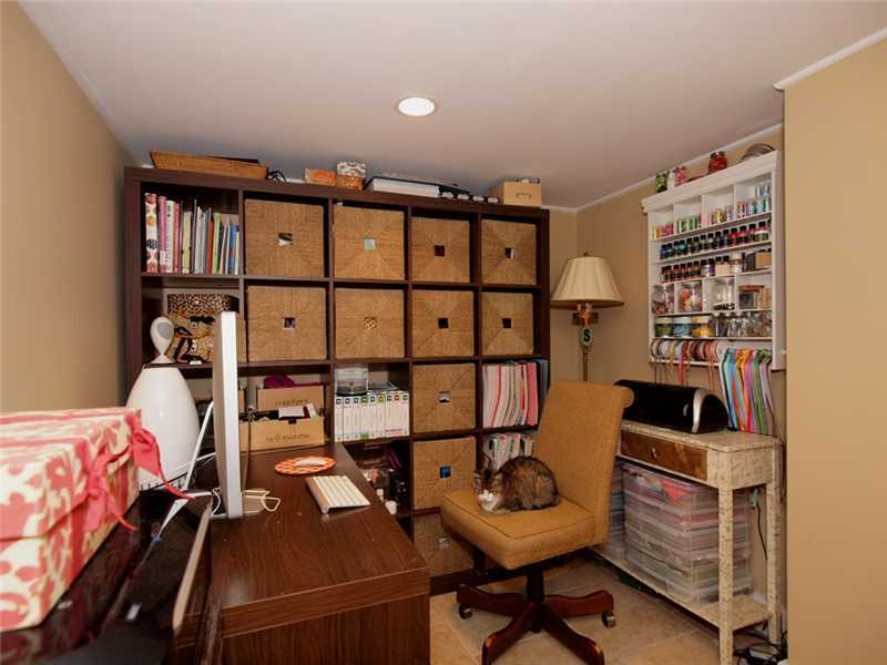 6 By Road Darien, CT 06820 - Photo 18 of 19 a bedroom with furniture and a book shelf
