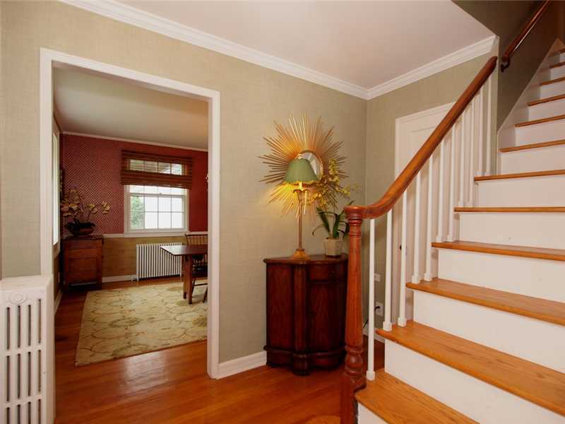 6 By Road Darien, CT 06820 - Photo 4 of 19 a view of entryway and hall with wooden floor