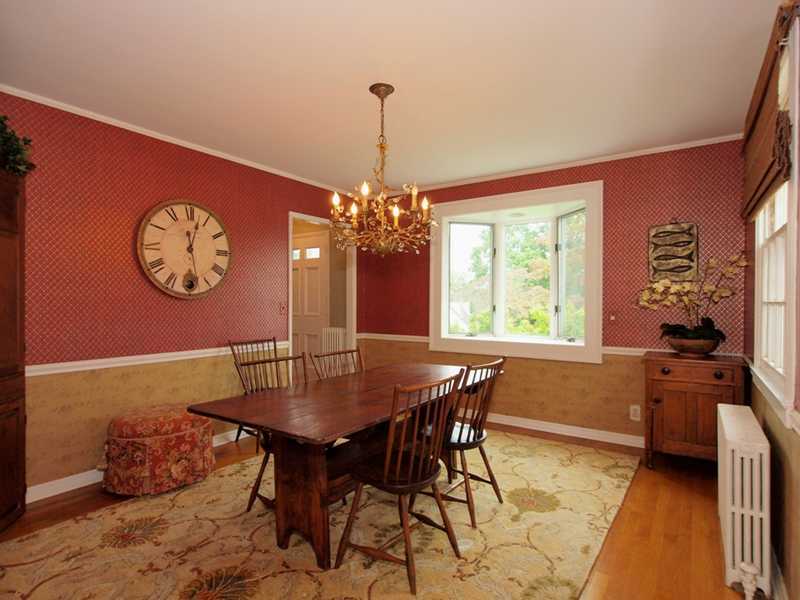 6 By Road Darien, CT 06820 - Photo 7 of 19 a view of a dining room with furniture window and wooden floor