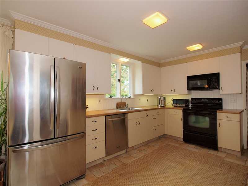 6 By Road Darien, CT 06820 - Photo 9 of 19 a kitchen with a refrigerator and a sink