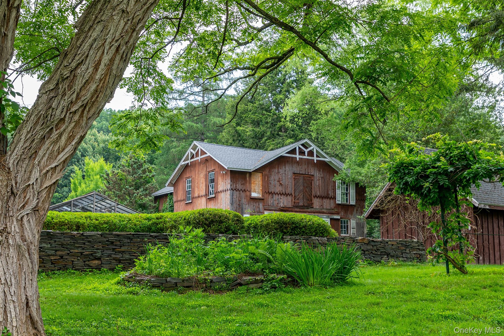 202 Buckwheat Road Hudson, NY 12534 - Photo 3 of 49 front view of a house with a yard