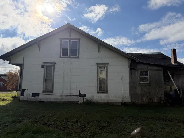 a house view with a garden space