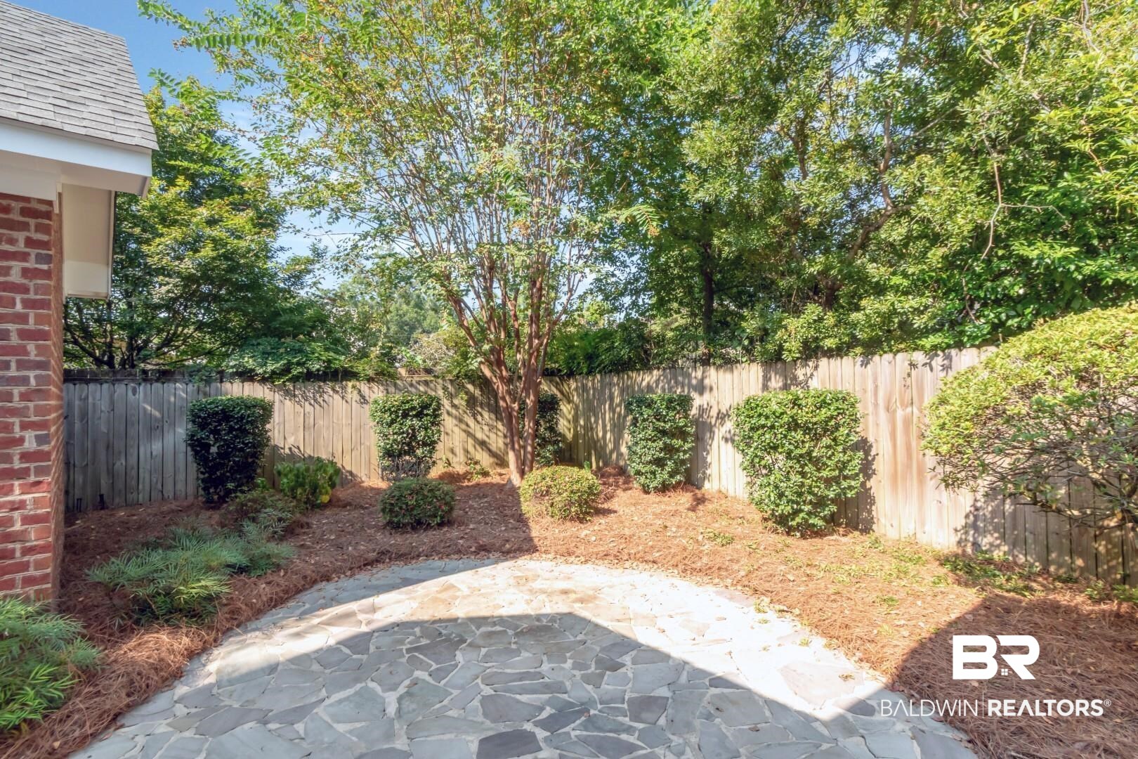 105 McHugh Lane Mobile, AL 36608 - Photo 22 of 30 Fenced backyard with a patio area