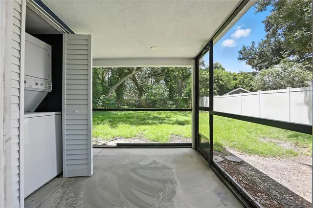 a view of a porch with a yard