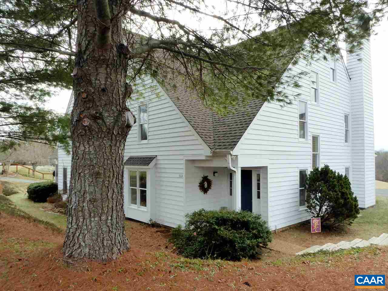 1064 Amber Ridge Road Charlottesville, VA 22901 - Photo 1 of 20 a front view of a house with garden