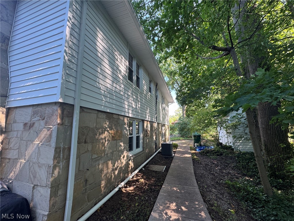 296 Fairfield Road Painesville, OH 44077 - Photo 41 of 48 Concrete walkway to the front of the home and storage shed