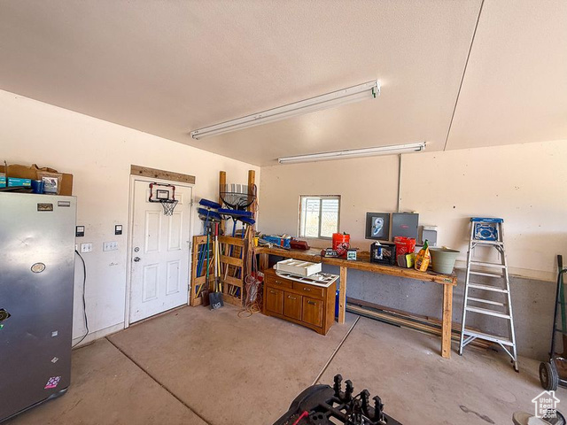 425 East Mule Deer Road Central, UT 84722 - Photo 52 of 72 Garage with freestanding refrigerator
