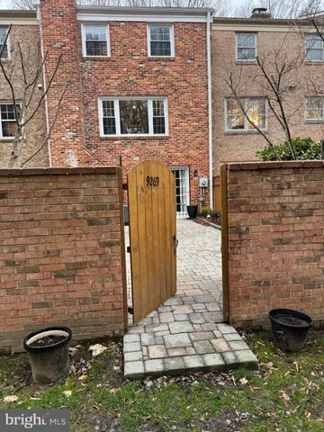 a backyard of a house with stairs