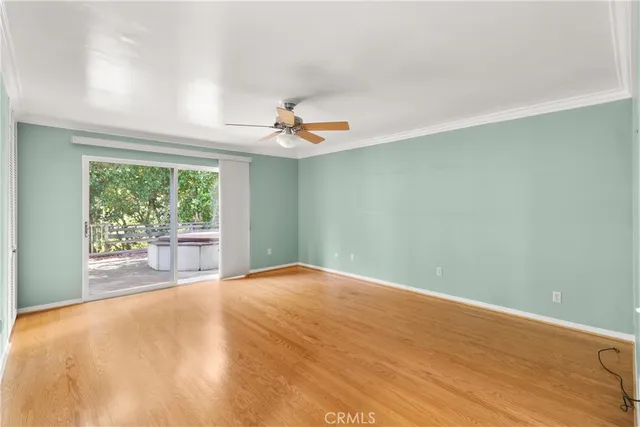 a view of a room with a large window