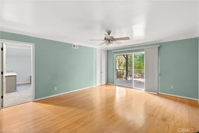 a view of a room with a large window