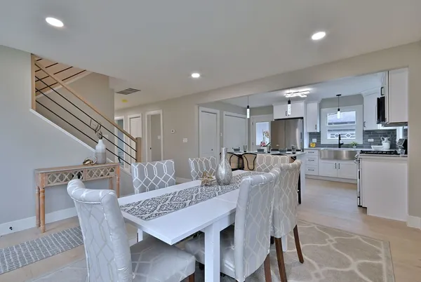 a view of a dining room with furniture