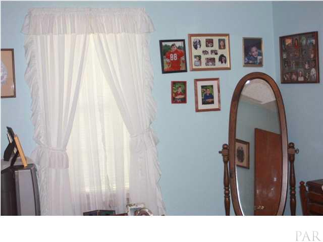 380 McKenzie Road Cantonment, FL 32533 - Photo 11 of 18 a black and white photo of a painting