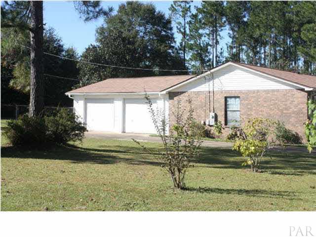 380 McKenzie Road Cantonment, FL 32533 - Photo 3 of 18 a backyard of a house