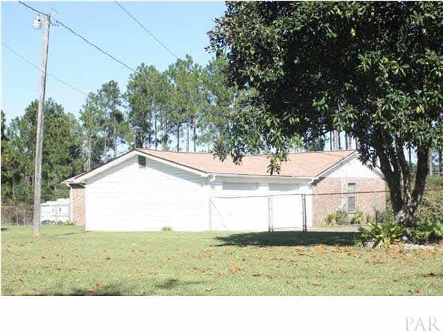 380 McKenzie Road Cantonment, FL 32533 - Photo 5 of 18 a house view with a outdoor space