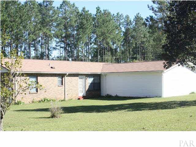 380 McKenzie Road Cantonment, FL 32533 - Photo 6 of 18 a view of a backyard