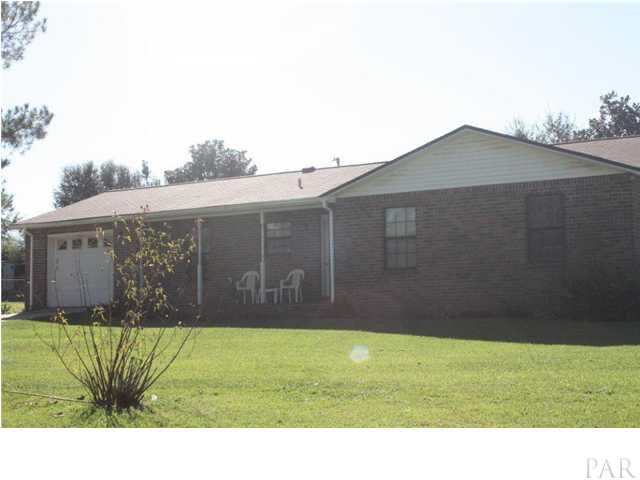 380 McKenzie Road Cantonment, FL 32533 - Photo 8 of 18 a view of backyard with outdoor space