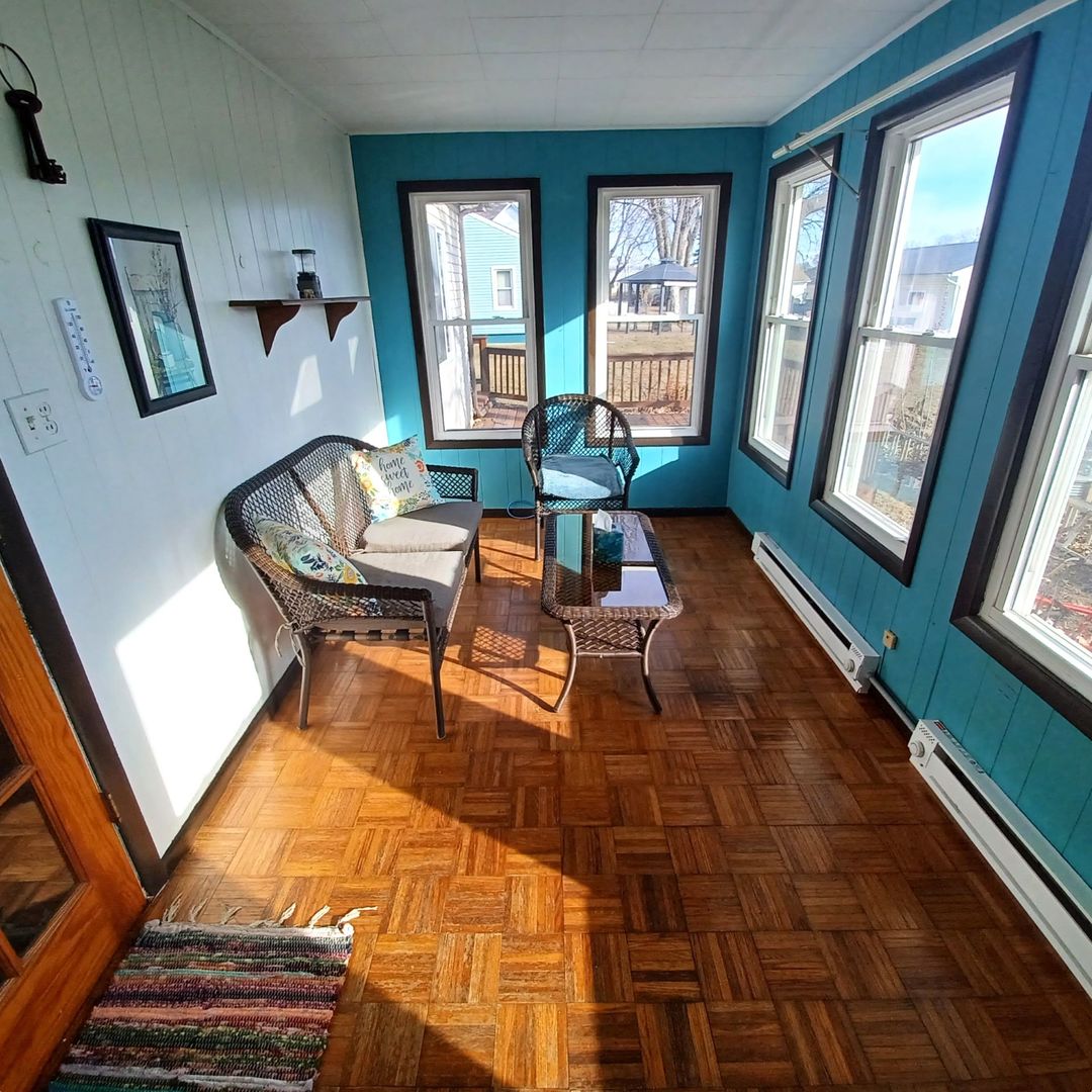 701 East 9th Street Kewanee, IL 61443 - Photo 11 of 56 a living room with furniture and a fireplace