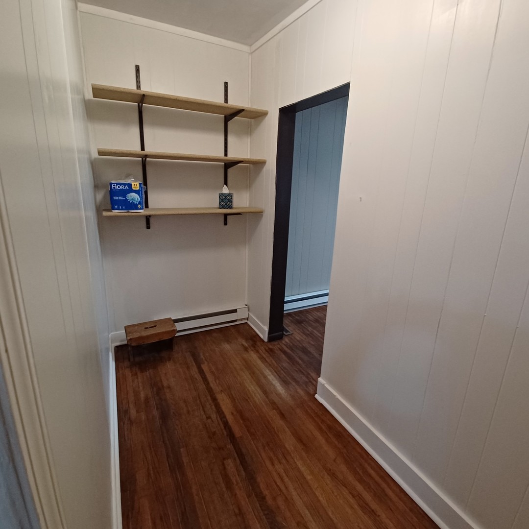 701 East 9th Street Kewanee, IL 61443 - Photo 27 of 56 a view of walk in closet with empty racks