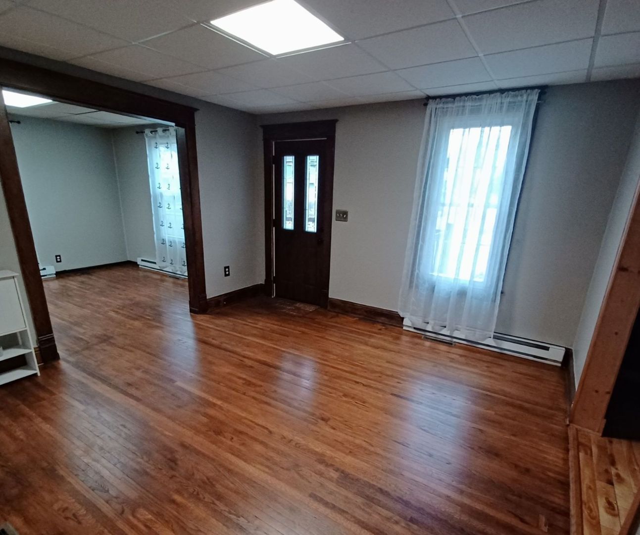 701 East 9th Street Kewanee, IL 61443 - Photo 31 of 56 an empty room with wooden floor and windows