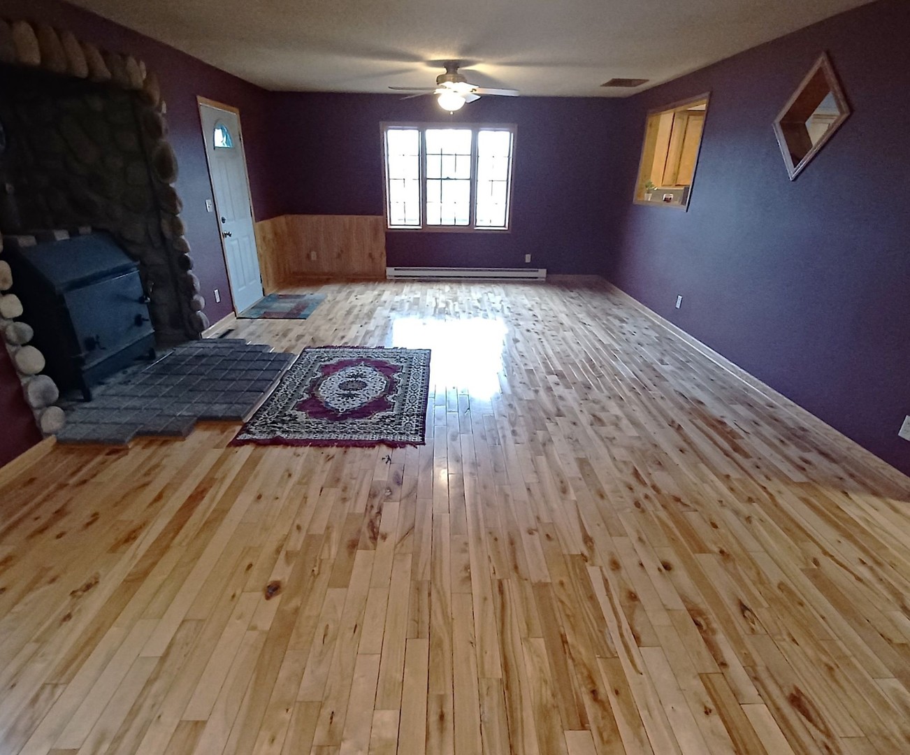 701 East 9th Street Kewanee, IL 61443 - Photo 35 of 56 a view of a livingroom with wooden floor and window