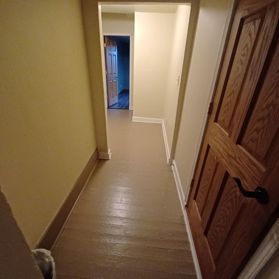 701 East 9th Street Kewanee, IL 61443 - Photo 44 of 56 a view of a hallway with wooden floor and staircase