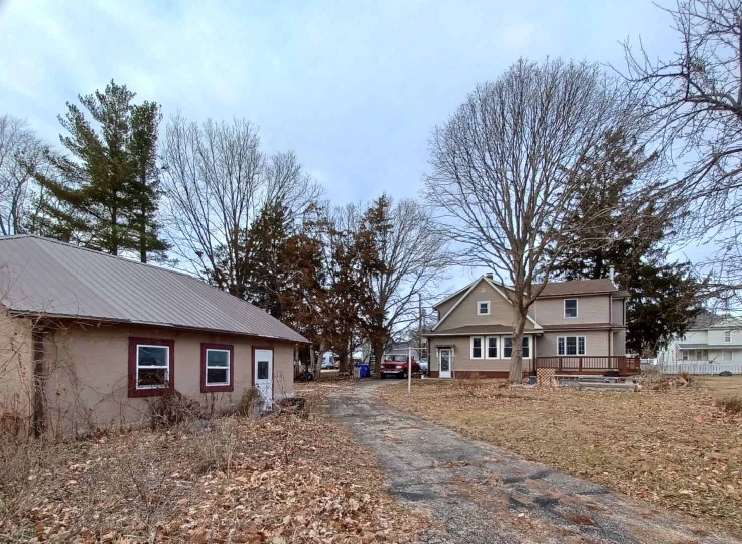 701 East 9th Street Kewanee, IL 61443 - Photo 6 of 56 a view of house with a big yard and large trees