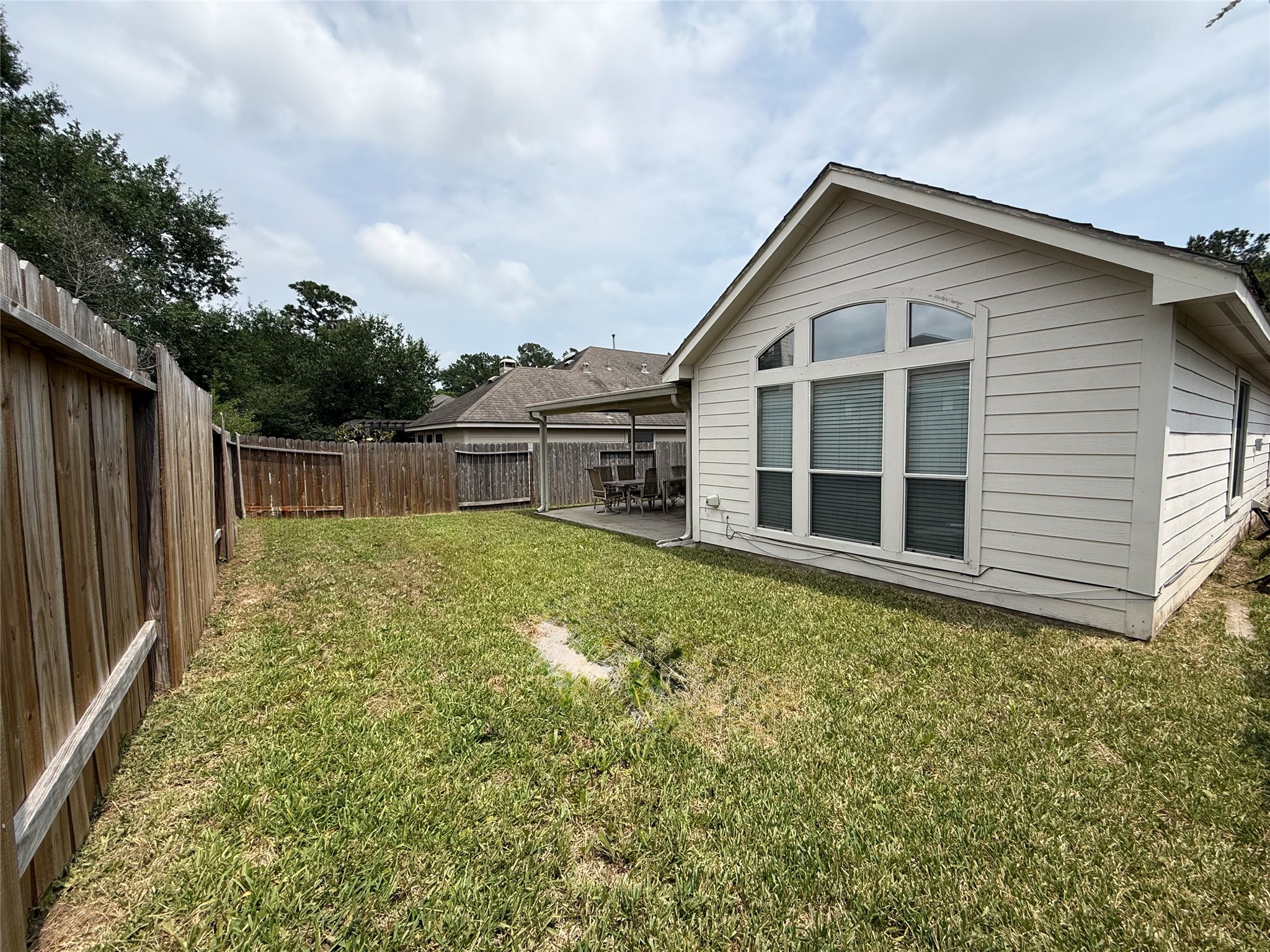 2327 Kylie Court Spring, TX 77386 - Photo 13 of 15 a view of a house with backyard and garden