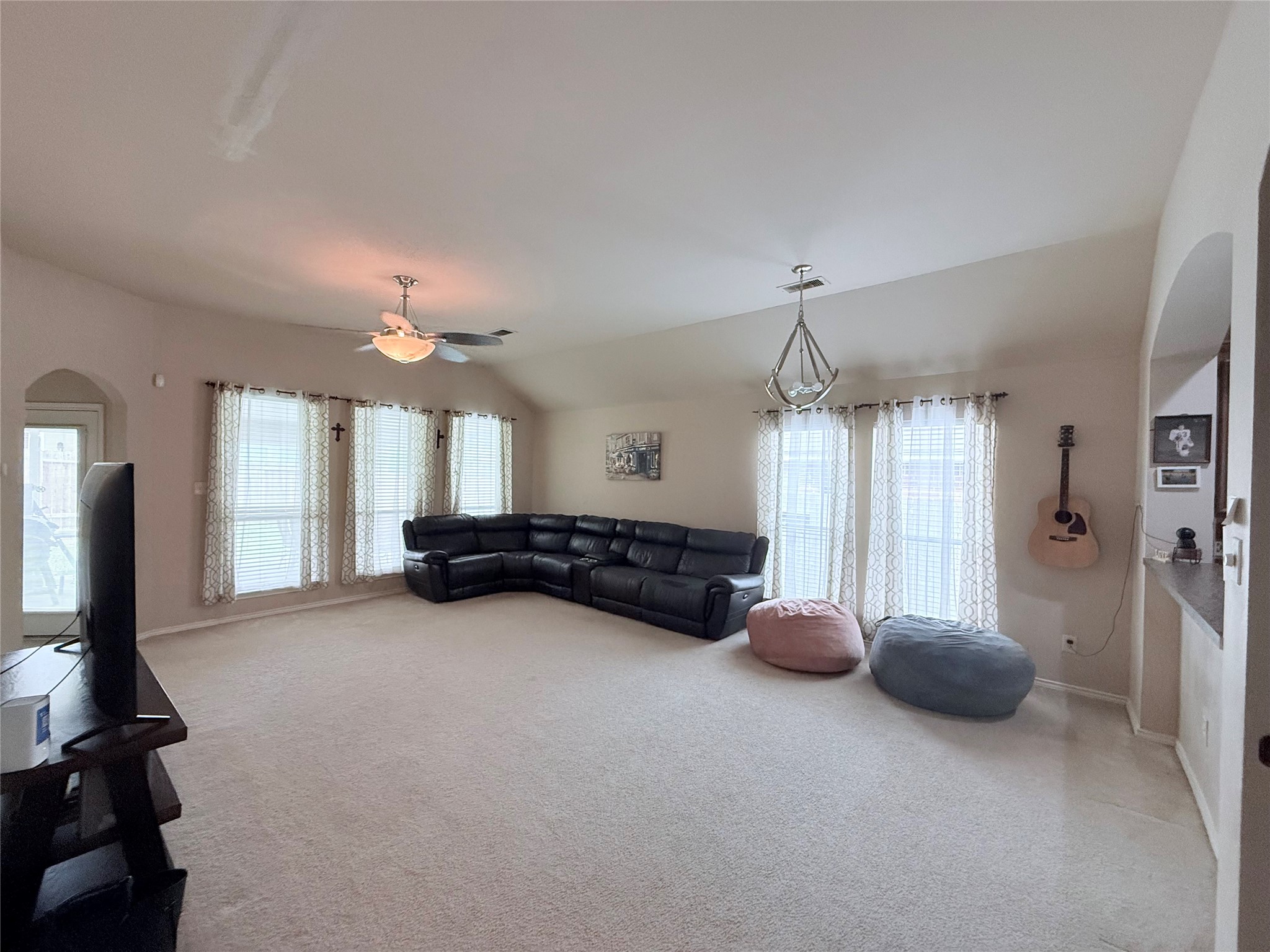 2327 Kylie Court Spring, TX 77386 - Photo 5 of 15 a room with gym equipment and a large window