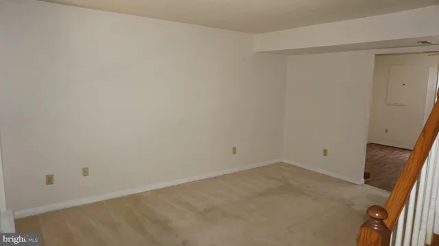a view of a hallway with a chandelier