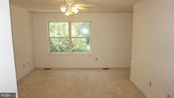 an empty room with a window