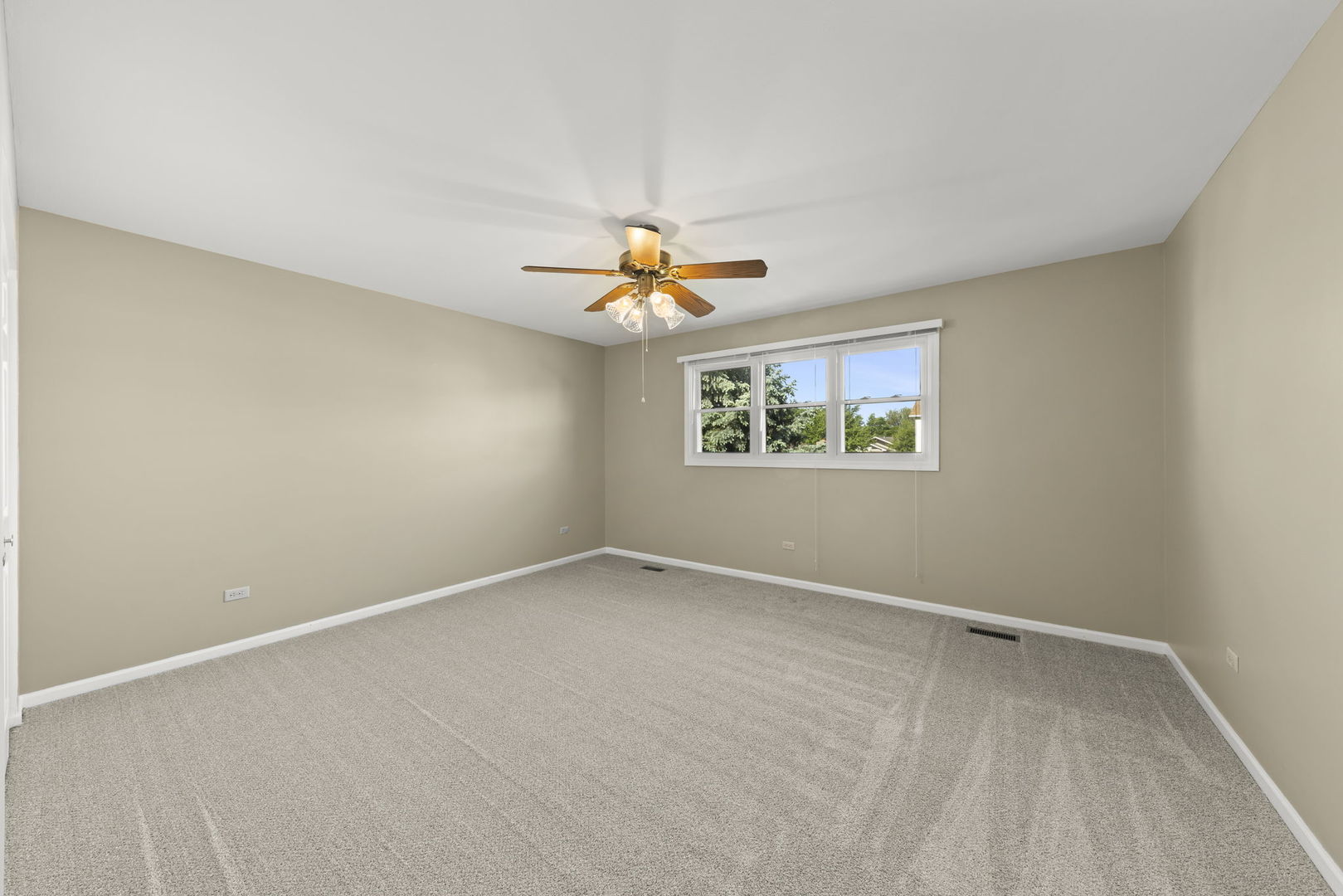 1925 William Drive Crest Hill, IL 60403 - Photo 13 of 32 wooden floor in an empty room with a window