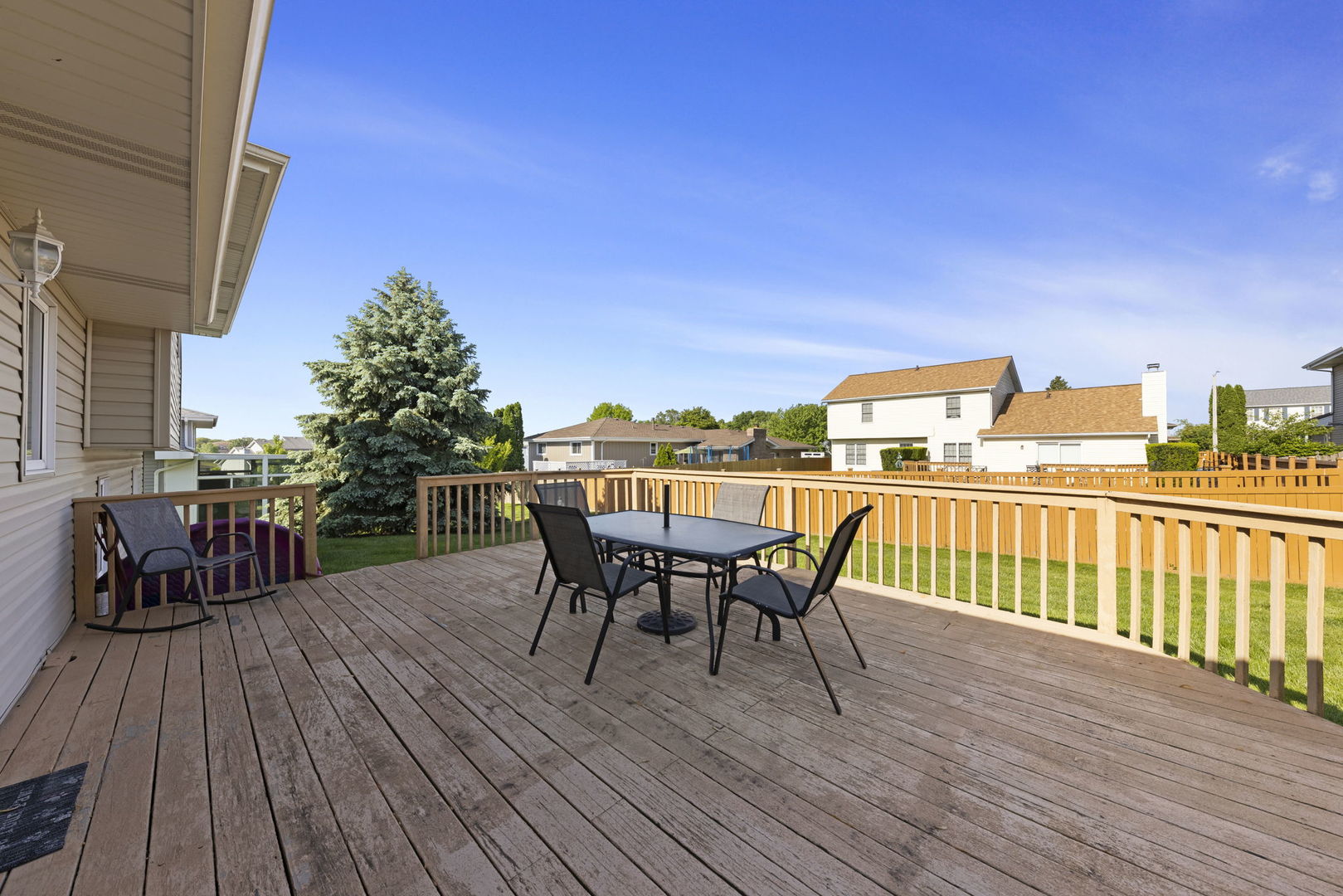 1925 William Drive Crest Hill, IL 60403 - Photo 24 of 32 a view of a balcony with furniture and wooden floor