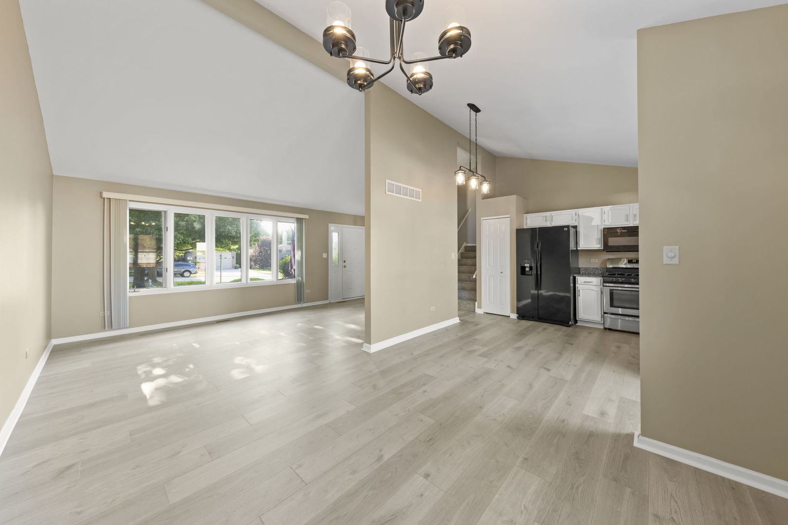 1925 William Drive Crest Hill, IL 60403 - Photo 6 of 32 a view of an empty room with a window