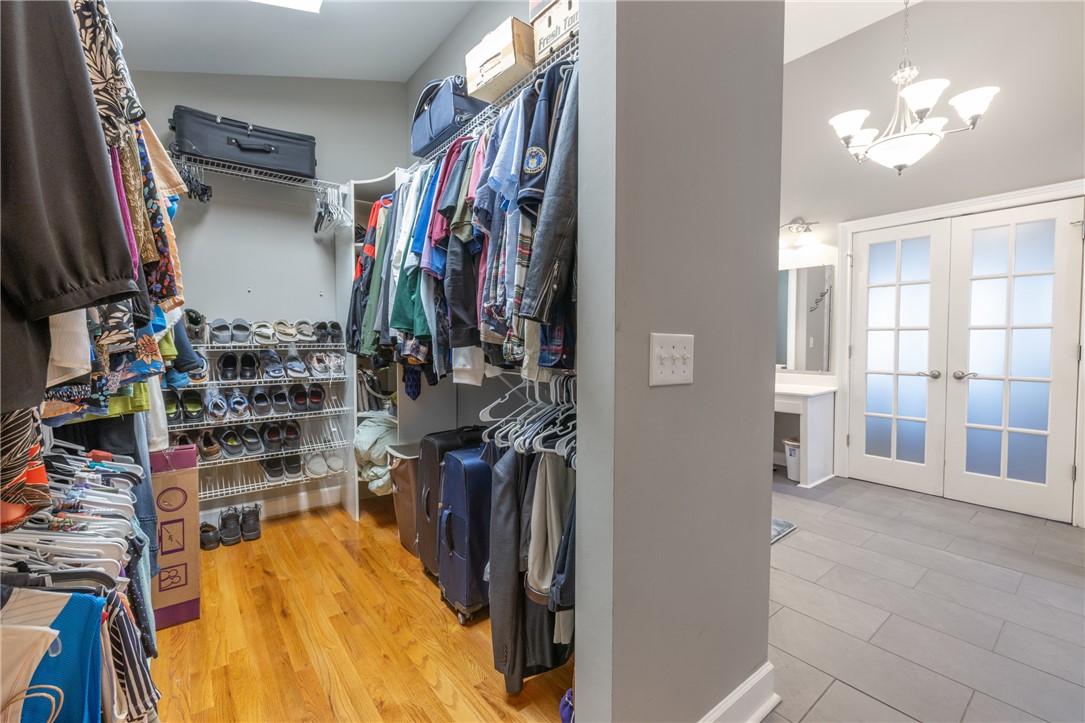 204 Riverlake Road Fair Play, SC 29643 - Photo 22 of 50 This spacious closet features ample storage and a clear view to the adjoining bath.