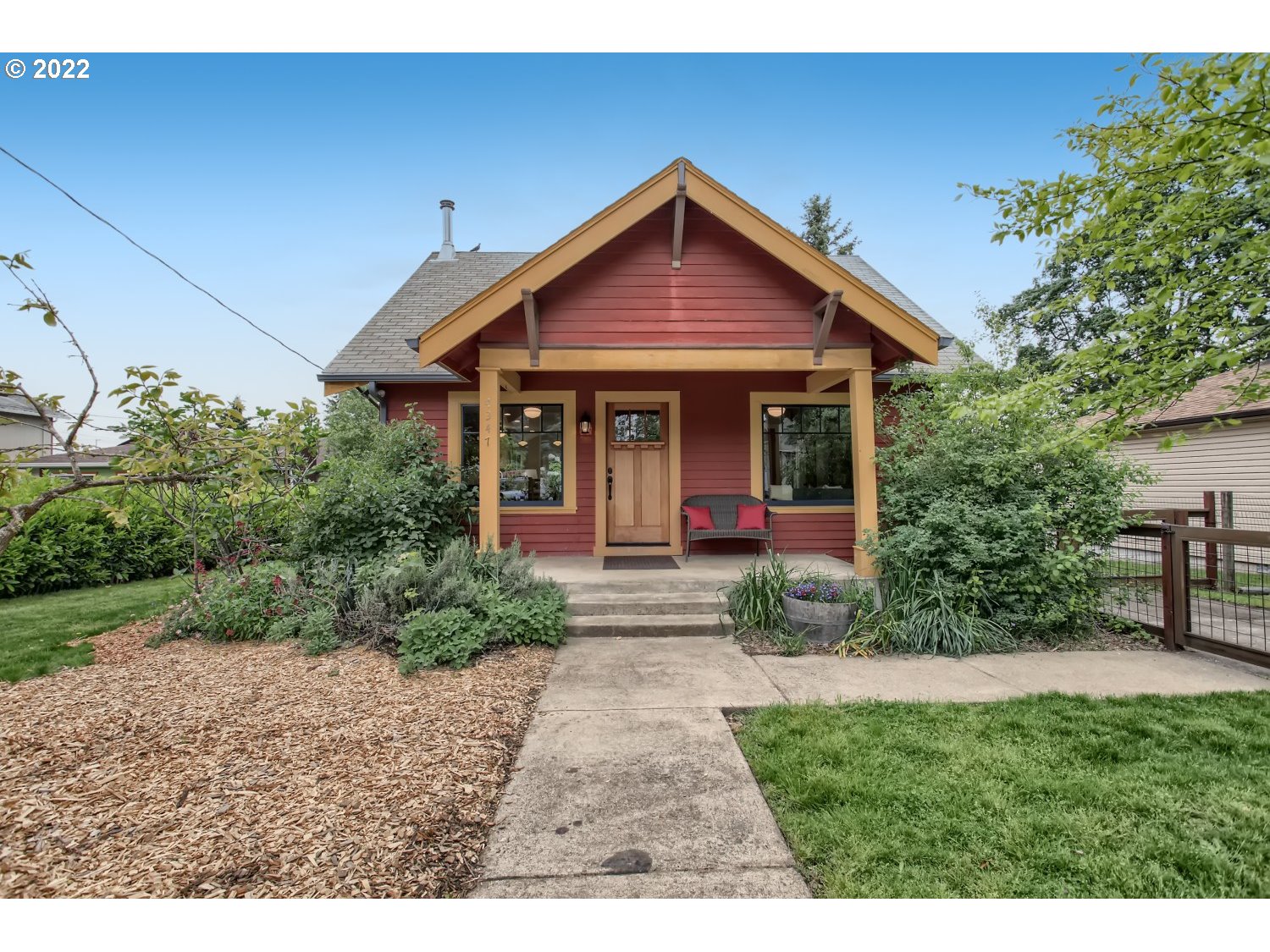 4347 Northeast Sumner Street Portland, OR 97218 - Photo 1 of 25 a front view of a house with garden